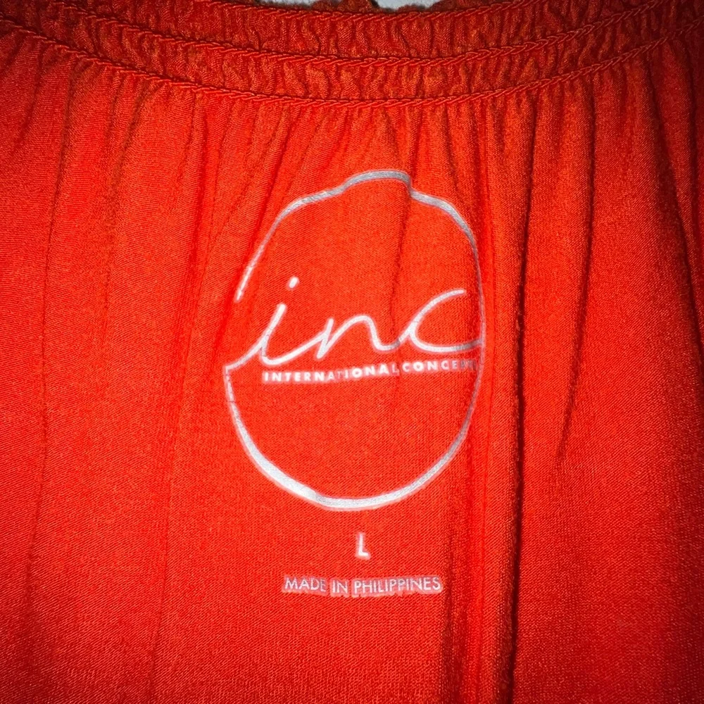 INC International Concepts orange top, size Large.
95% rayon & 5% spandex - Picture 3 of 4